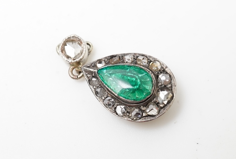 A sapphire bar brooch and an enamel and diamond pendant, early 20th century